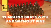 SmythBusters: Tumbling Brass with and Without Pins