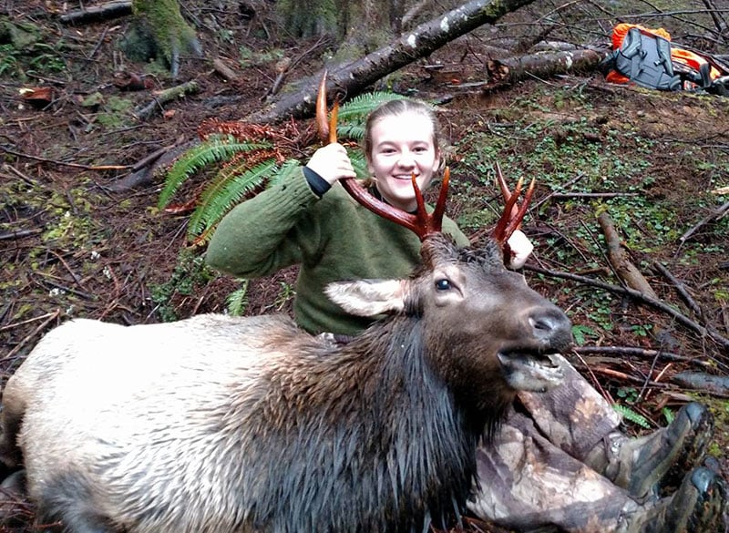 Mike's daughter with her first solo elk.
